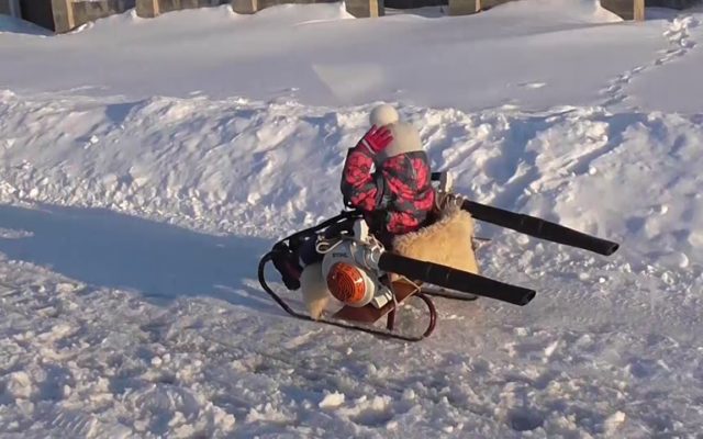 A Child’s “Snowmobile Sled” Powered by a Couple of Leaf Blowers