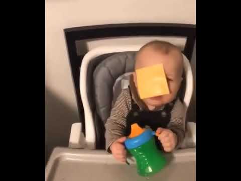 A Dad Tosses a Cheese Slice That Sticks to His Baby’s Face