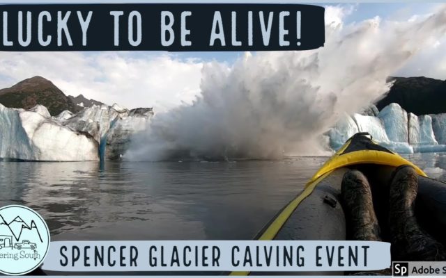 A Kayaker Is Nearly Buried by Massive Chunks of Ice Breaking Off a Glacier
